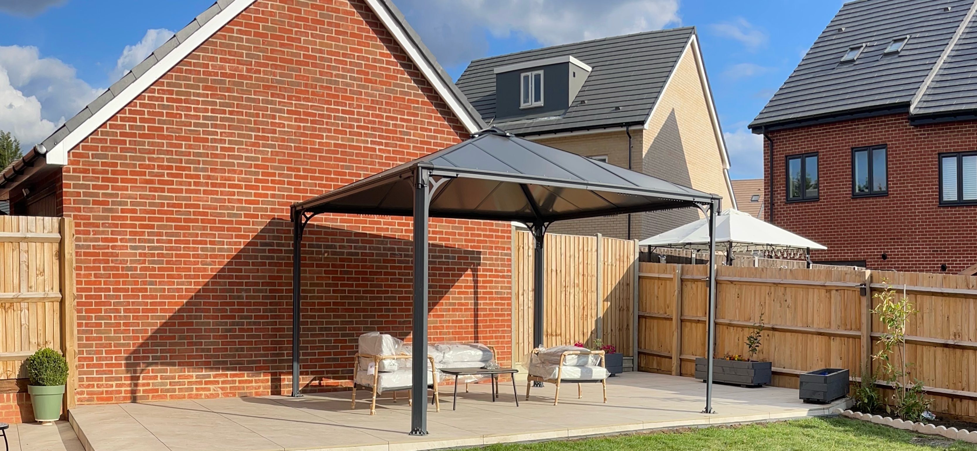 Raised decking platform with glass balustrade