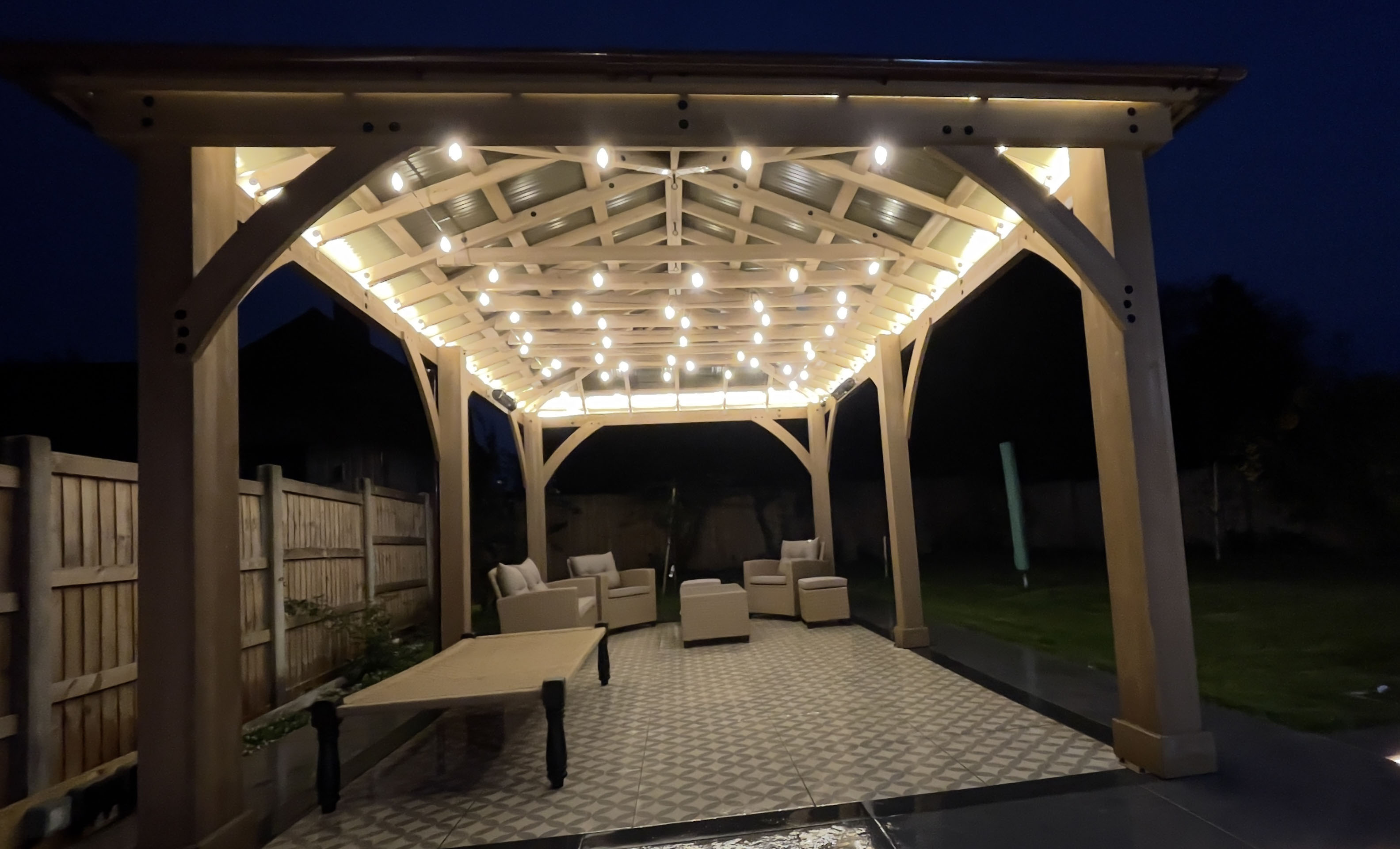 Composite decking with pergola by TJ Rose Landscapes